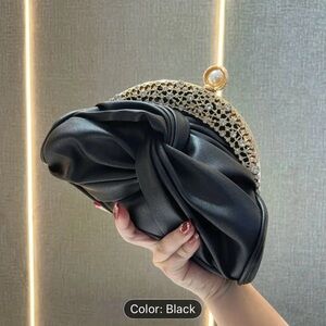 Elegant Black Clutch with Gold Accents